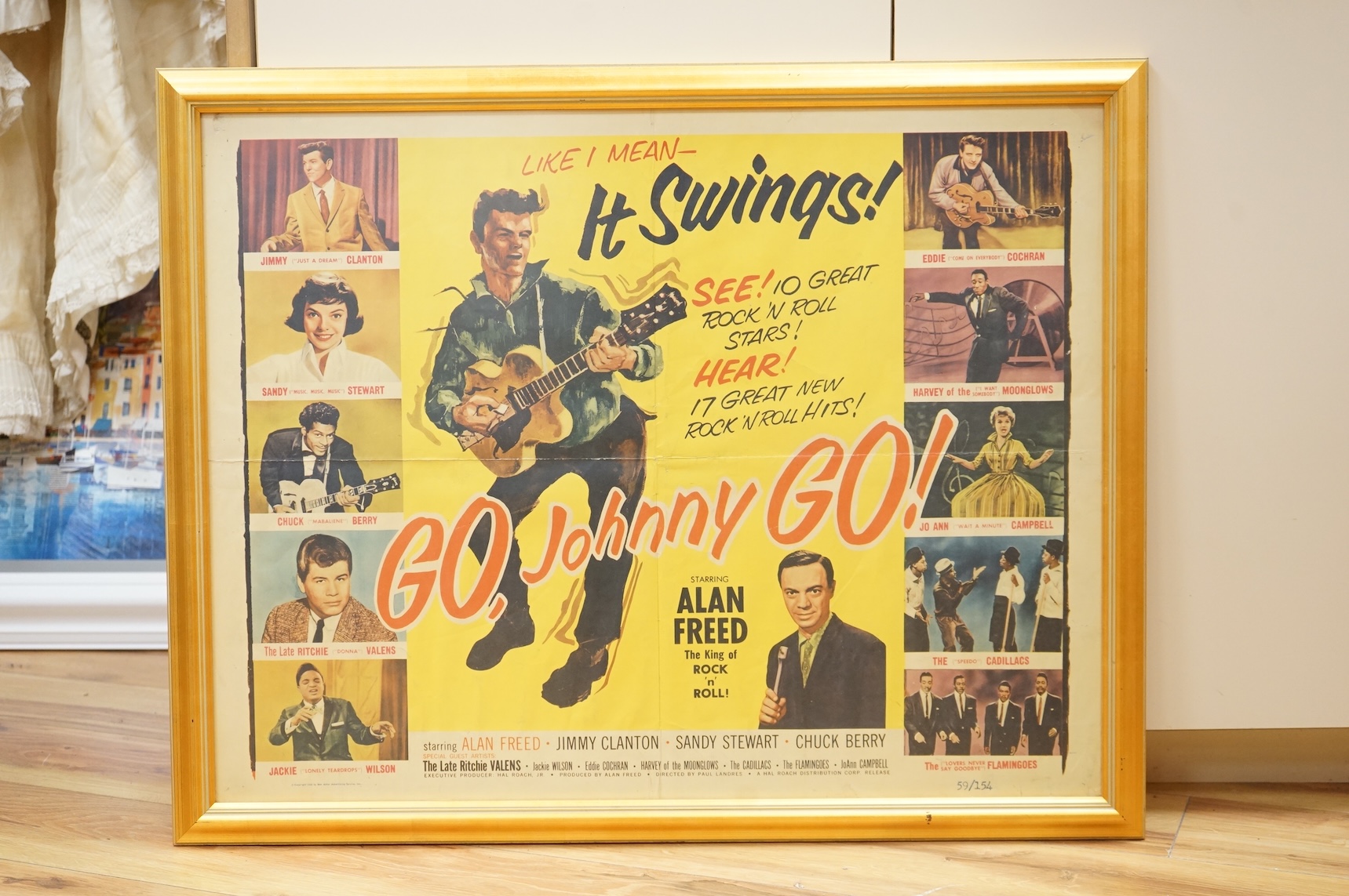 A framed 1950s Rock ‘n’ Roll advertising film cinema poster; ‘Go, Johnny Go!’, starring Alan Freed, and featuring Chuck Berry, Ritchie Valens, Jackie Wilson, Eddie Cochran, etc., dated 1959 by Ben Adler Advertising Servi